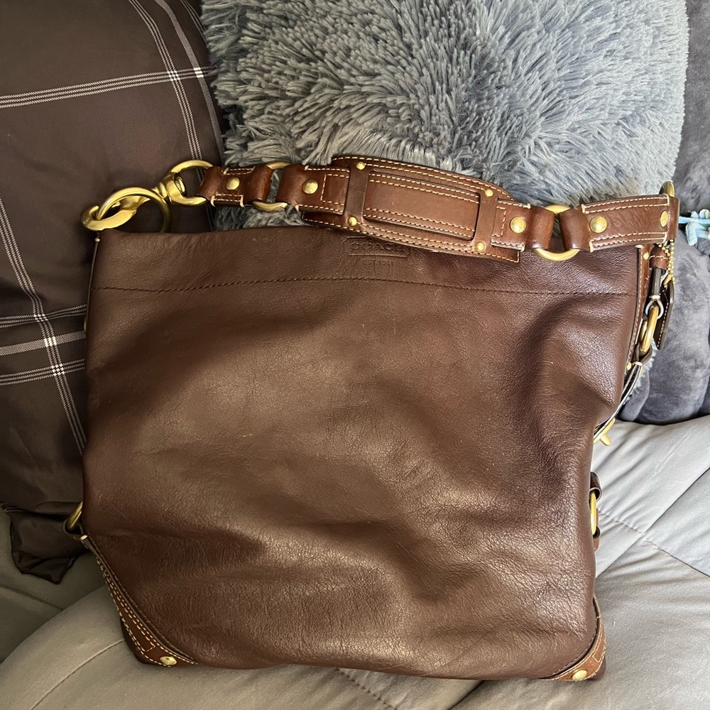 Coach brown leather bag with gold belted accents